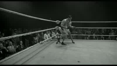 And he wobbles into the ropes and goes down! - Raging Bull