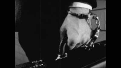 And I noticed that
handcuffed to his left wrist - JFK: What The Doctors Saw