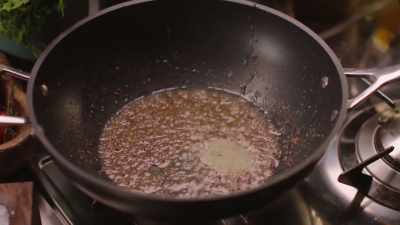 And more heat with
some dried red chilli flakes. - Nigella: At My Table