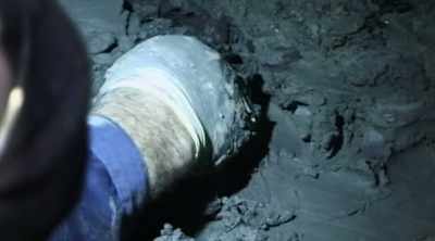 And as researchers scrape away
the layers of solid sediment, - Mysteries of the Deep