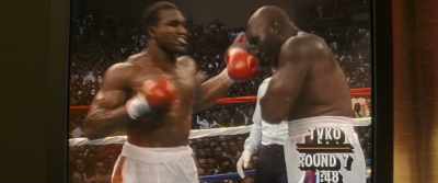 And he rocks Foreman again
with a vicious left. - Big George Foreman