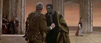 And see, your wife is with him. - Othello