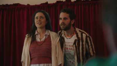 And she's looking down,
not quite from above. - Theater Camp