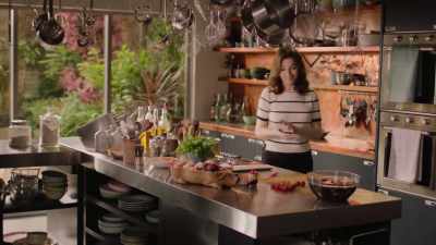 And slice these cherry
tomatoes across the equator. - Nigella: At My Table