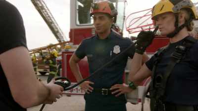 ♪ And the man in the back
said everyone attack... ♪ - 9-1-1