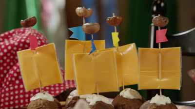 And the table is anchored
by a conch shell - At Home with Amy Sedaris