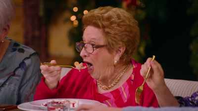- And then down below,
we have a coconut cake. - Baking It