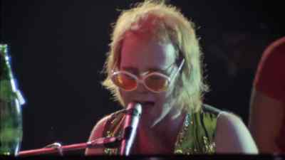 And then in the restroom,
there was a guy... - Elton John: Never Too Late
