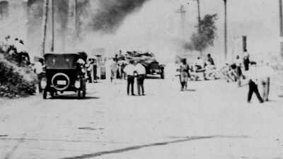 And he told his mother
they're coming. - The Legacy of Black Wall Street