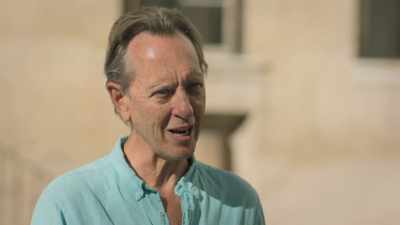 And unfortunately
he has to murder - Write Around the World with Richard E Grant