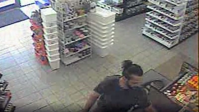 Andy was also caught on camera
rapidly paying for fuel - Killers: Caught on Camera