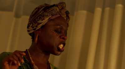 Angels and demons shuttling
deceased souls to heaven, - Tales from the Hood 3