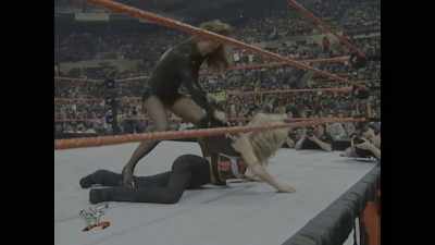 [announcer 1] He's burning! Put him out! - Mr. McMahon