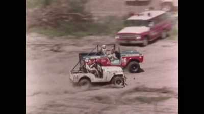 ANNOUNCER: And the Ford
is now passing - John Bronco