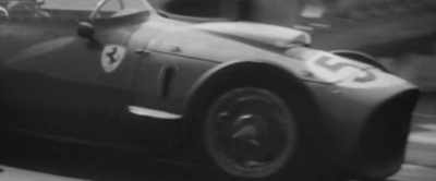 ANNOUNCER: Just watch
Moss's beautiful control - Brabham