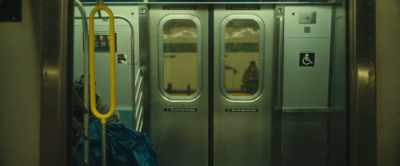 [ANNOUNCER SPEAKING
INDISTINCTLY] - A New York Story