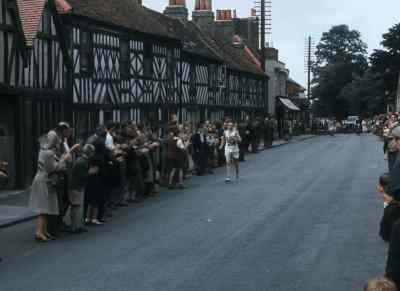 Another British runner, Tom Richards,
well back but reserving his power. - XIVth Olympiad: The Glory of Sport