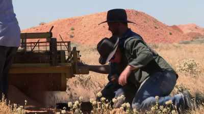 Another hole, and another
$60 hole in their pockets. - Outback Opal Hunters