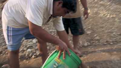 ANY REMAINS ARE RELEASED
BACK INTO THE WATER. - Lost Cities of the Amazon