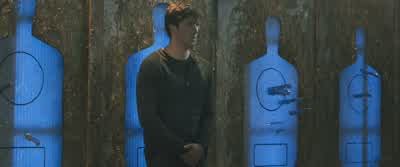 Anyone can stand in front of a target. - Divergent