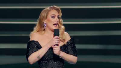 -Anyway... I am!
-[AUDIENCE LAUGHS] - An Audience with Adele
