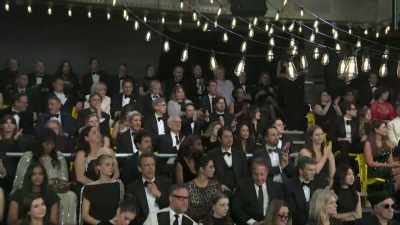 ‫[ Applause ]
‫.
‫Also, at work by the way, - SNL50: The Anniversary Special