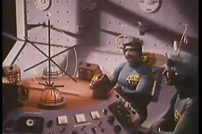 Approaching
projected Earth orbit. - Santa Claus Conquers the Martians