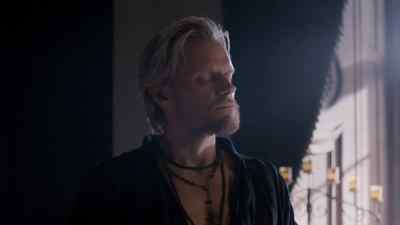 Aramis wears a jewelled crucifix. - The Musketeers