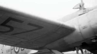 ARCHIVE VOICEOVER:
The Aston takes off - Scotland from the Sky