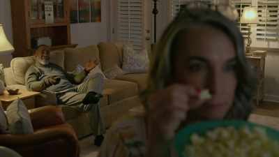 - Are you gonna share
the popcorn, missy? - The Neighbors Are Watching