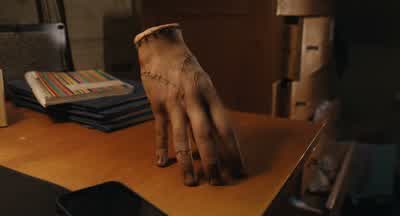 - -Okay. Okay. I'm taking orders from a hand. This isn't weird at all. - Wednesday
