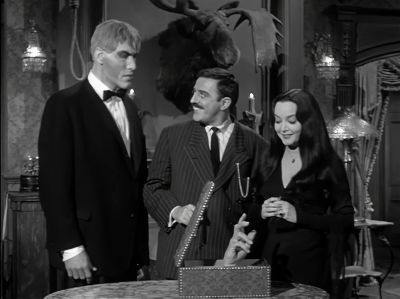 Aren't you going to let Thing
know that you're glad he's back? - The Addams Family