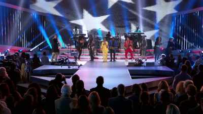 ♪ Aristocrats
on a mountain climb ♪ - Let's Go Crazy: The Grammy Salute to Prince