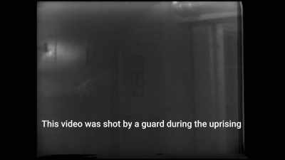 Arm is pointing to a
hand print on the wall, - Betrayal at Attica