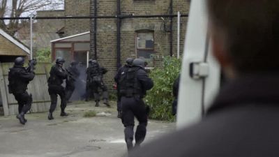 Armed police! Lay down your weapons! - A Family Man