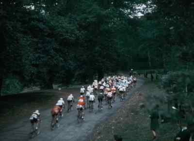 Around the course, they keep a
sharp lookout for the leaders, - XIVth Olympiad: The Glory of Sport