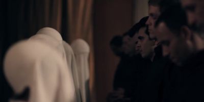 As a token of this vow, - The Handmaid's Tale