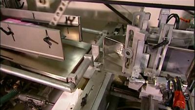 AS A VACUUM OPENS THE BAG, - How It's Made