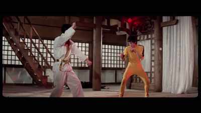 'As both men lie on the floor, exhausted, - The Final Game of Death