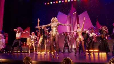 As it clung to her thigh - The Rocky Horror Picture Show: Let's Do the Time Warp Again