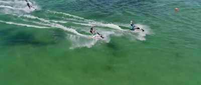As she crosses the finish line, - Hot Water
