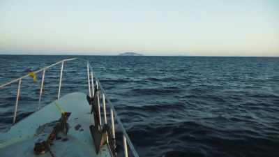 As they draw close to the island, - The Green Planet
