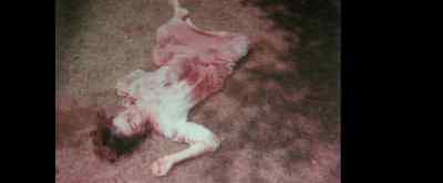 As they left, Atkins
used Tate's blood - Once Upon a Time in Hollyweird