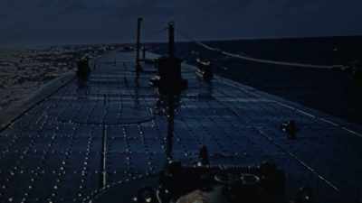 AS NIGHT FALLS ON
D-DAY, AN AMERICAN SUB - The Pacific War in Color
