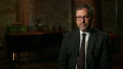 As that second guard comes
to the guard desk, - History's Greatest Heists with Pierce Brosnan