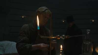 As you see, the flame has formed
a reflective surface on the glass, - Taboo