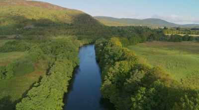 As the Cairngorm Mountains
become more distant, - World's Most Scenic River Journeys