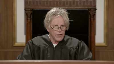 As we were checking in, - Gary Busey: Pet Judge
