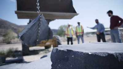 As we're breaking apart
the concrete slab, - Buried In The Backyard