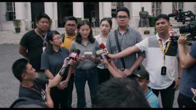 Asking officials questions,
face-to-face, - A Thousand Cuts